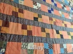 Antique Handmade Quilt with very vintage farbic and all hand knotted