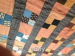 Antique Handmade Quilt with very vintage farbic and all hand knotted