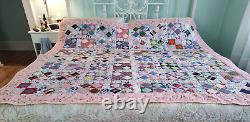 Beautiful, classic four patch quilt, made from pastel colores solid pink68 X 80