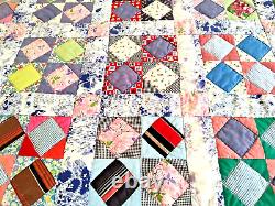 Beautiful, classic four patch quilt, made from pastel colores solid pink68 X 80