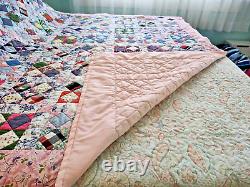 Beautiful, classic four patch quilt, made from pastel colores solid pink68 X 80