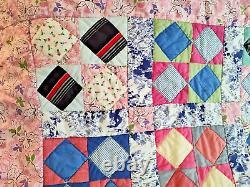 Beautiful, classic four patch quilt, made from pastel colores solid pink68 X 80