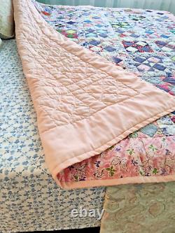 Beautiful, classic four patch quilt, made from pastel colores solid pink68 X 80