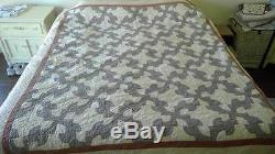 GORGEOUS HANDMADE QUILT VINTAGE AND USED A HANDFUL OF TIMES APPROX 84 x 74
