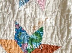 Hand-stitched antique/vintage feedsack quilt