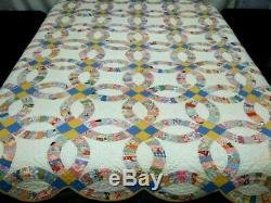 Handmade Vintage Double Wedding Ring Quilt with 1940s Fabric