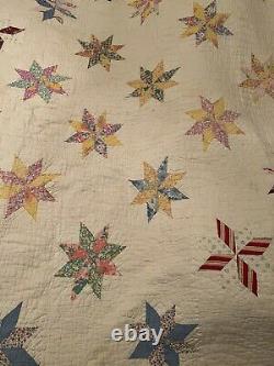 Vintage Hand Stitched Quilted Quilt 8 Point Star Quilt Feed Sack floral 60 x 92