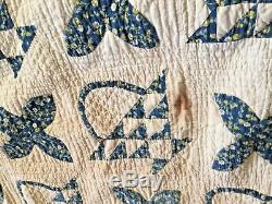 Vintage hand made appliqué quilt with basket and flowers