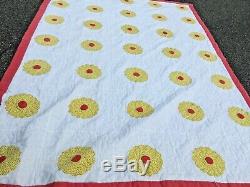Vintage handmade Appliqué quilt in great color cream yellow and red. 70. X. 100