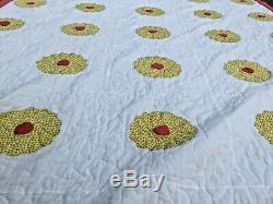 Vintage handmade Appliqué quilt in great color cream yellow and red. 70. X. 100