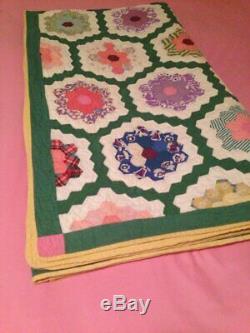 Vintage handmade Grandmother's Garden quilt