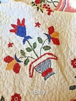 Vintage handmade quilt done in cross-stitch wonderful bright color