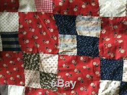 Vintage handmade quilt wonderful colors in red blues and browns